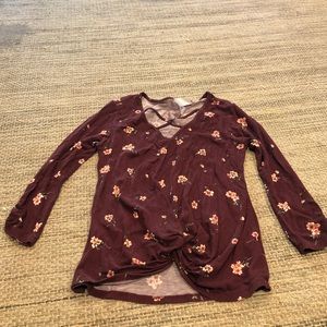 Plum colored 3/4 shirt with v neck and flowers